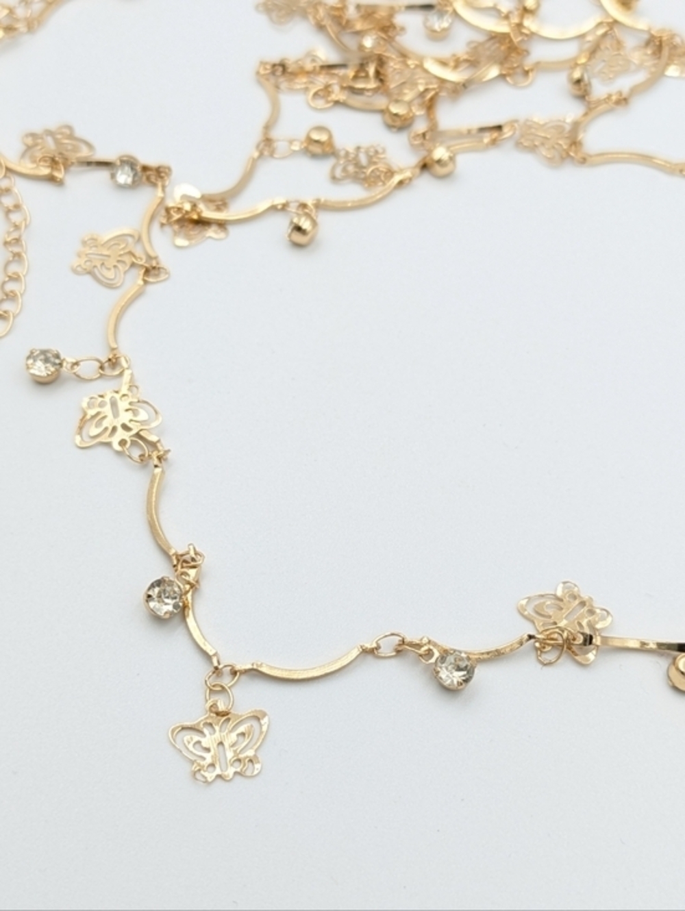 Y2K waist belt or belly chain gold tone with rhinestones and butterflies